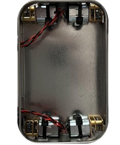 The empty tin with motors mounted inside